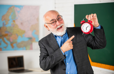 Improve teaching skills. Mature pedagogue communicating. Final thoughts. Man bearded tutor in classroom. Teaching is his passion. Main task in teaching. Formal education. Classic subjects learning © be free