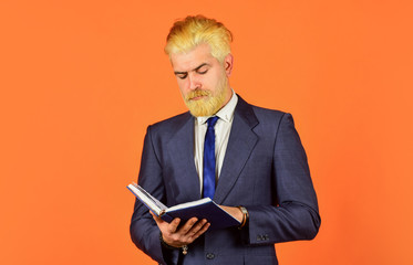 Innovation for creating smart future. Business school education. Serious businessman hold book. Mature man reading book. Keep studying. Education for adults. Self education. Teacher lecturer speaker