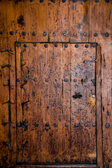 old wooden door background, hand forged nails