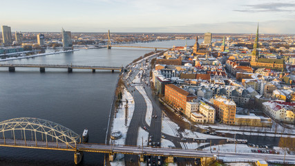 Aerial video from flying drone panoramic to Old Riga, Academy of Sciences, River Daugava and Riga Bridges on a Beautiful Sunny Winter Day (series)