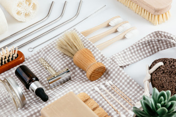 Sustainable living plastic free domestic accessories arranged on white table isometric view