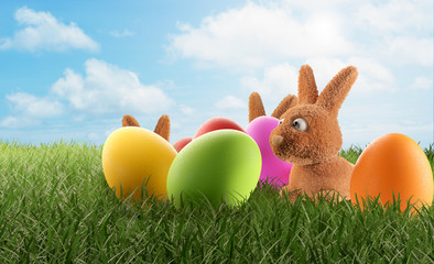 a small young cute Easter bunny and colored eggs 3d-illustration