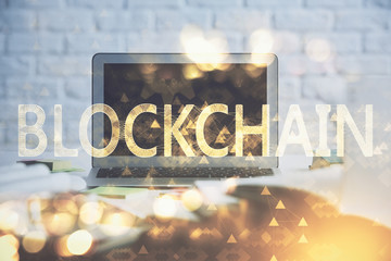 Multi exposure of blockchain and crypto economy theme hologram and table with computer background....