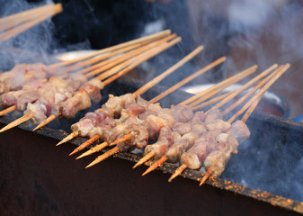 Close-up of lamb kebabs, outdoors,