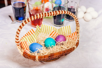 Festive Easter eggs in the basket are ready for the holiday.