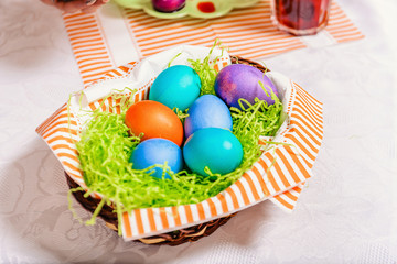 Festive Easter eggs in a basket.