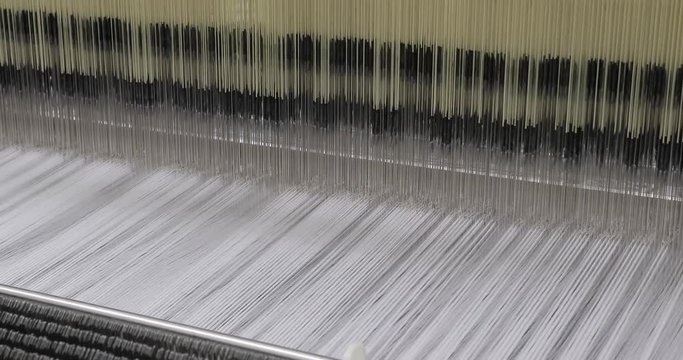 Weaving loom industrial textile production at work