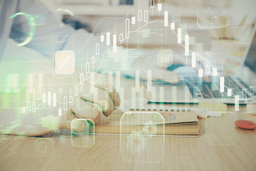 Multi exposure of financial graph with man works in office on background. Concept of analysis.