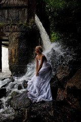 Fototapeta na wymiar Young Bride On A River