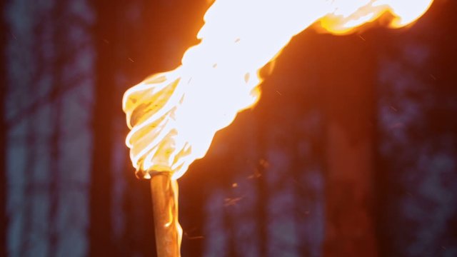 Handmade torch - piece of cloth burning on the stick