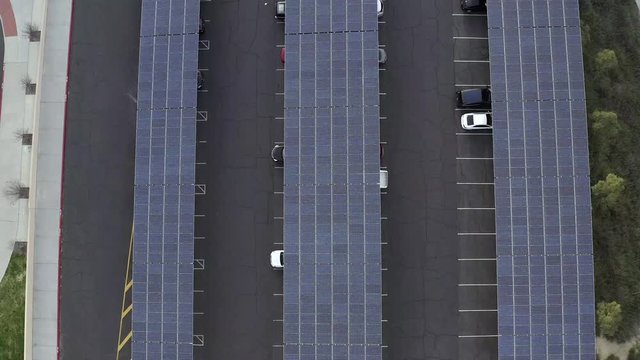 Solar panel project on car park roof, Santa Clarita, California, rising drone