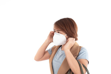 Young woman use a mask to protect air pollution.
