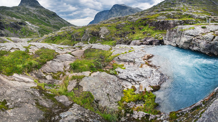 Norway troll road in summer. Norwegian beautiful nature and nordic typical mountain river landscape in Trollstigen