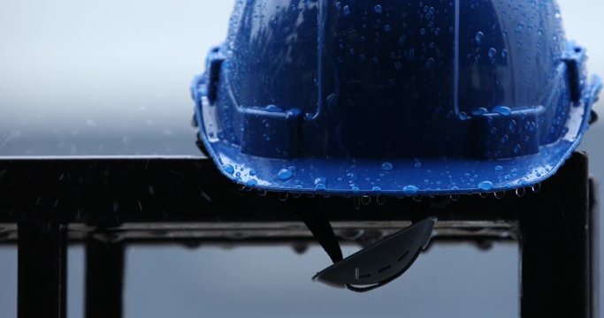  heavy rain and construction safety helmets, blue hard safety helmet and raining