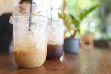 Cups of plastic ice milk coffee drinks