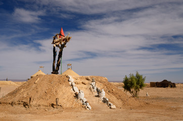 Berber tent and earth mound at a Khettara well in the arid Tafilalt basin of Morocco
