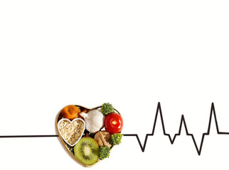meal for heart health. set of helpful ingredients for heart. cardiogram imitating line showing good heartbeat.