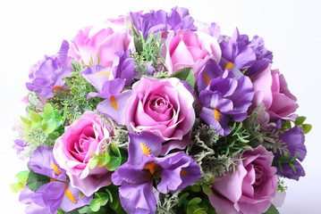 Colorful flower arrangement centerpiece in square glass vase