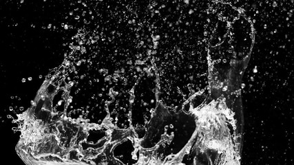 Slow motion of water splash abstract particle on black background - Powered by Adobe
