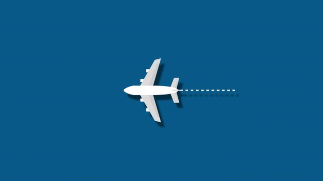 Passenger plane flying through the frame .