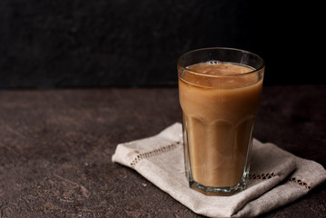 Glass Of Cold Coffee On Wood