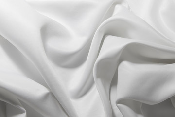 Naklejka na ściany i meble Closeup of white fabric texture background ,wavy fabric