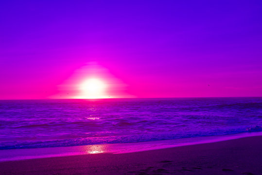 violet sunset over beach
