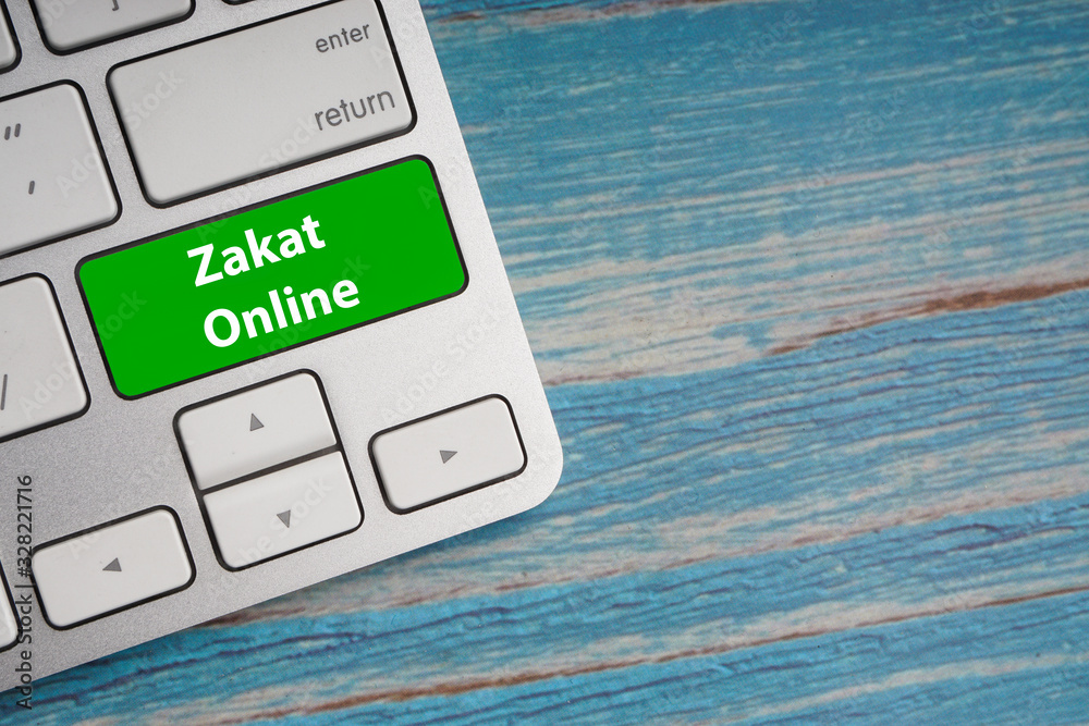 Fototapete zakat online text on button of computer keyboard. business and islamic concept