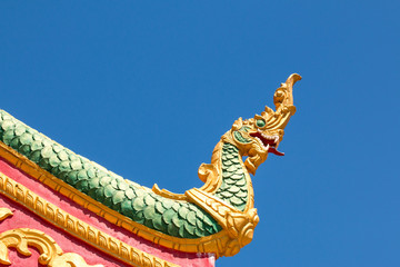 Fototapeta na wymiar Dragon detail of That Ing Hang, Savannakhet, Lao