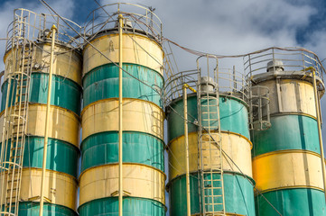 Concrete mixing plant. Four vertical towers for storing cement