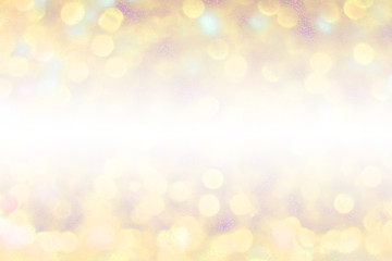 Obraz premium gold and red bokeh background with glitter.