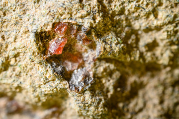 Czech garnet crystals macro view.