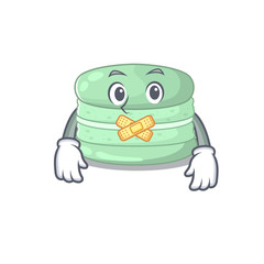 cartoon character design pistachio macaron making a silent gesture