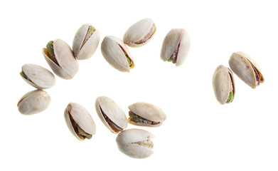 Ripe pistachios nuts isolated on a white background