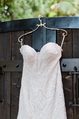 Lace Wedding Dress on Gold Hanger - 328228154
