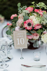 Wedding Centerpiece and Table Number with Pink Flowers - 328228172