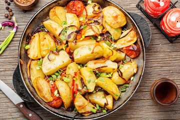 Roasted potato in a frying pan