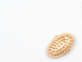 Massage brush, bathroom accessories on a white background. .