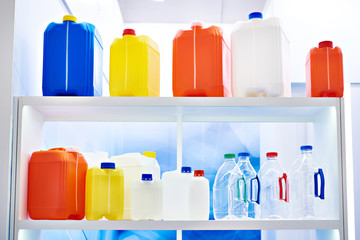 Plastic cans at store exhibition