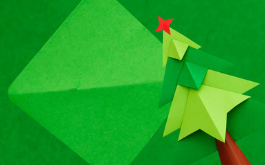 Christmas tree over green background