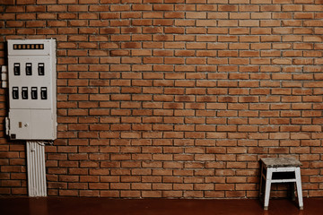 Interior of an empty room with a brick wall