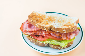 A BLT is a type of sandwich, named for the initials of its primary ingredients, bacon, lettuce and...