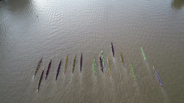 the start point boat race for 16 boats with 30 rowers during challenge title of river king regatta festival.	