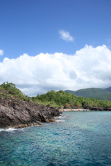 Green mountains on the coastline, Basse Terre, Guadeloupe, French Caribbean.