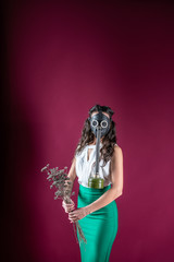 girl in a gas mask. against viruses. epidemic. radiation. protection against bacteria. coronavirus.