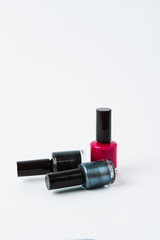 Obraz premium colored nail polishes on a white background