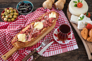 Turkish food pide with sosis sucuk salam and kaşar