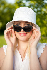 Happy young woman in a park