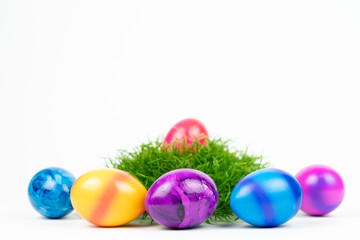 Fototapeta na wymiar Easter basket with colorful Easter eggs