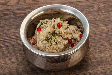 Vagan dietary cusine - mutabal with granet seeds